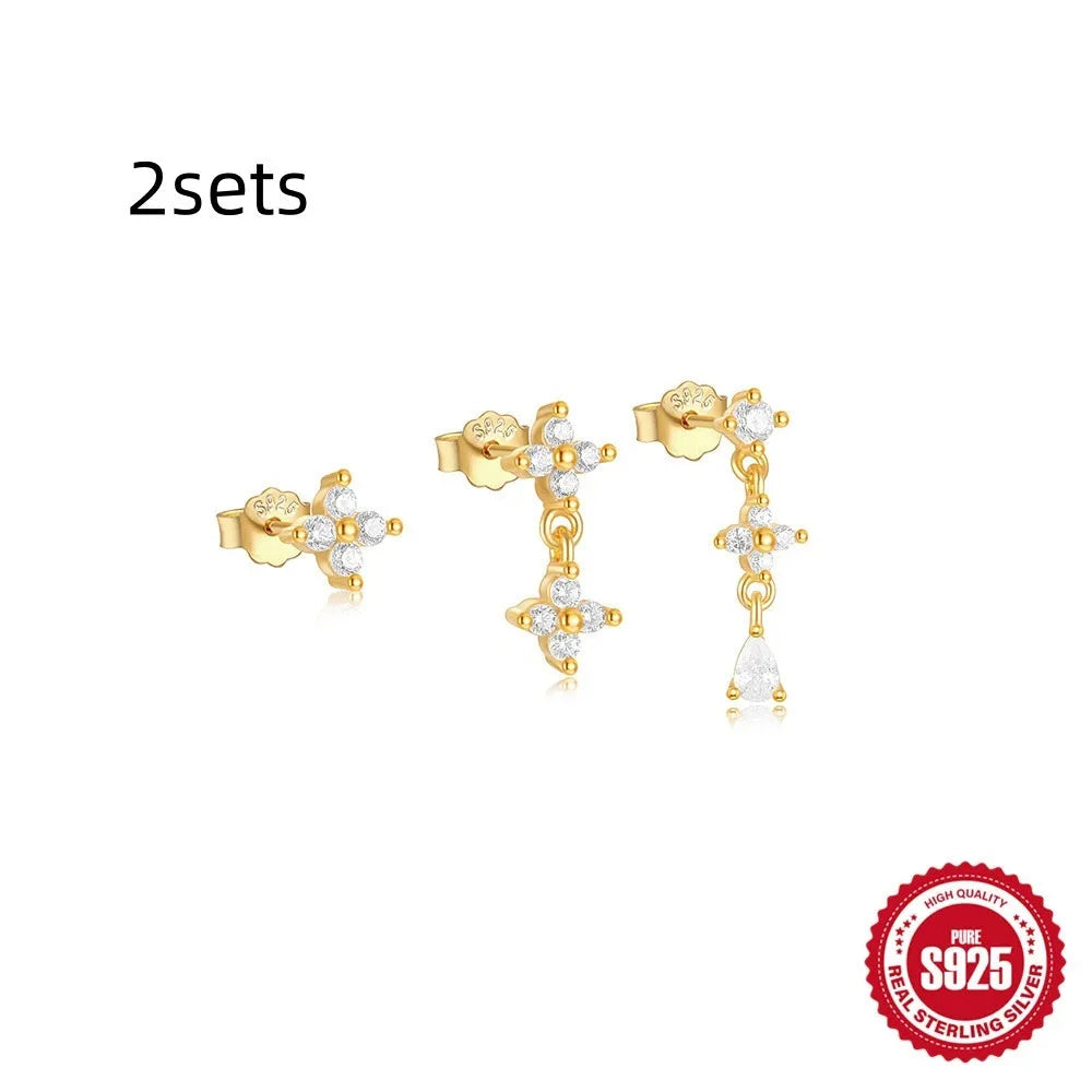 Set of three S925 sterling silver geometric stud earrings with zircon and tassel details on a jewellery card.
