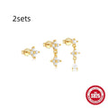 Set of three S925 sterling silver geometric stud earrings with zircon and tassel details on a jewellery card.