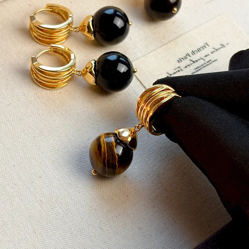 Geometric tigereye stone earrings for women with gold plating in brown and black colour options.