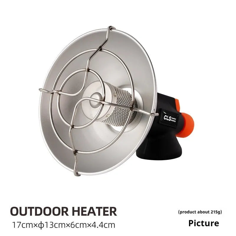 Black and orange mini portable outdoor gas heater stove with automatic ignition on a surface.