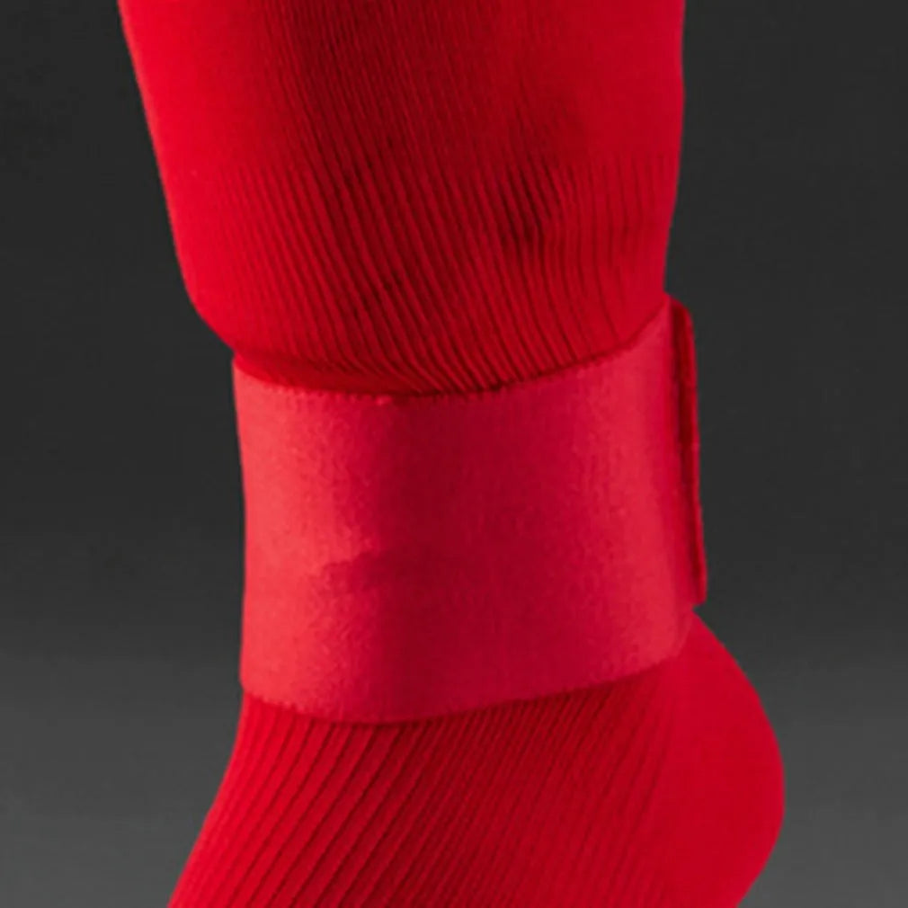 Red rubber football shin guard tape belt showing 250mm length and 65mm width dimensions