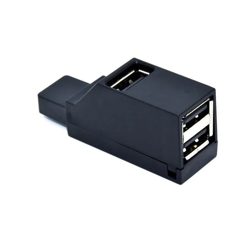 USB 2.0 mini portable splitter hub in black with four ports for laptop and desktop
