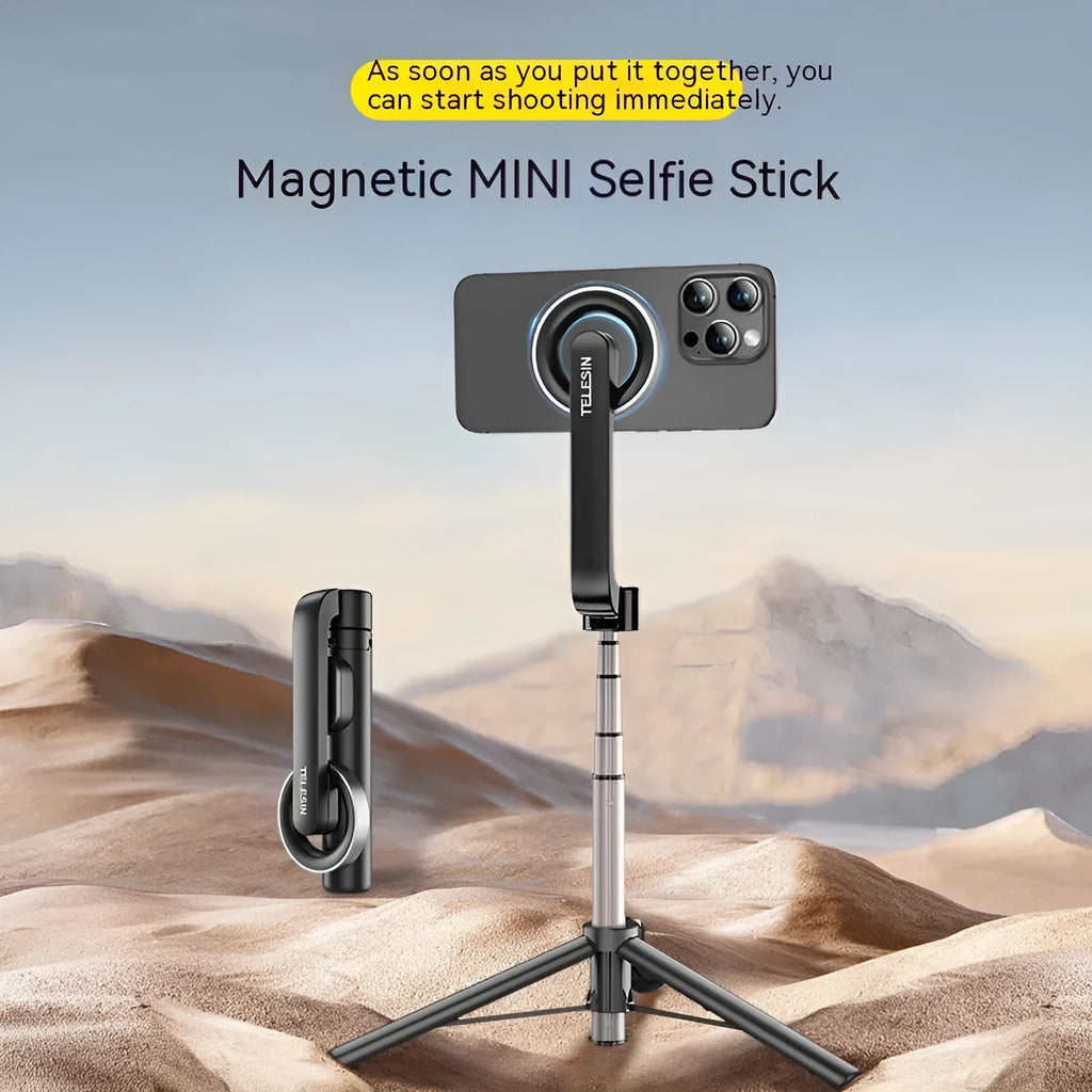 Magnetic mini selfie stick in black with Bluetooth remote and aluminium alloy tripod on a table