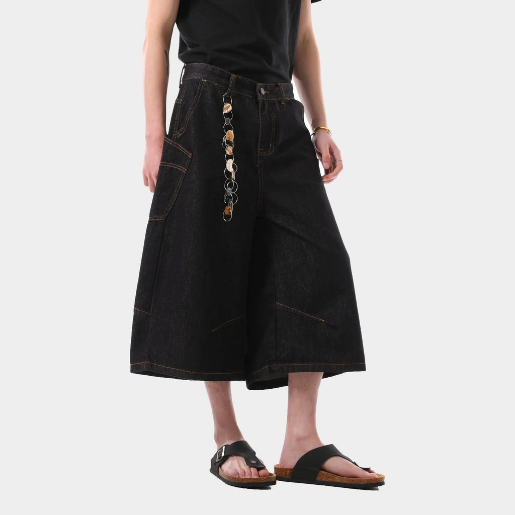 Men's black retro style cropped denim jeans with side pockets on a straight leg.