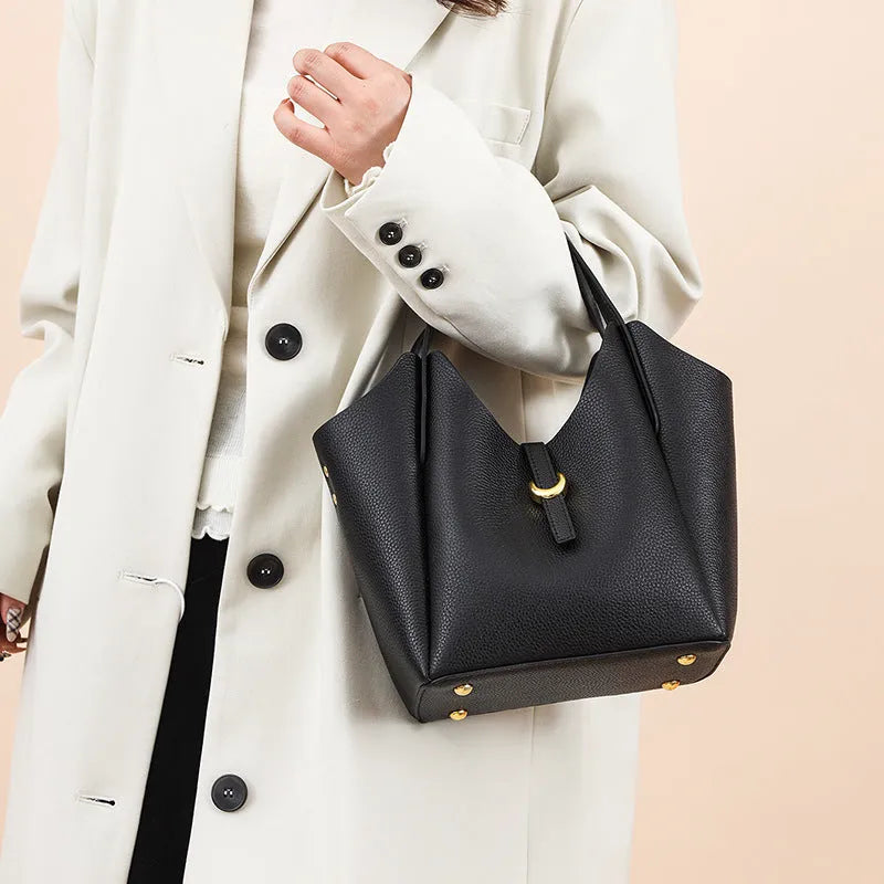 Genuine leather women's hand held retro bucket bag in beige with top handle