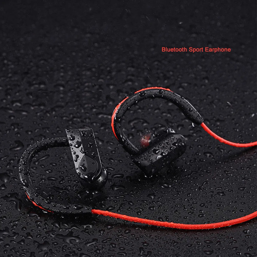 Black wireless neckband Bluetooth earphones with in-ear buds and a USB charging cable.