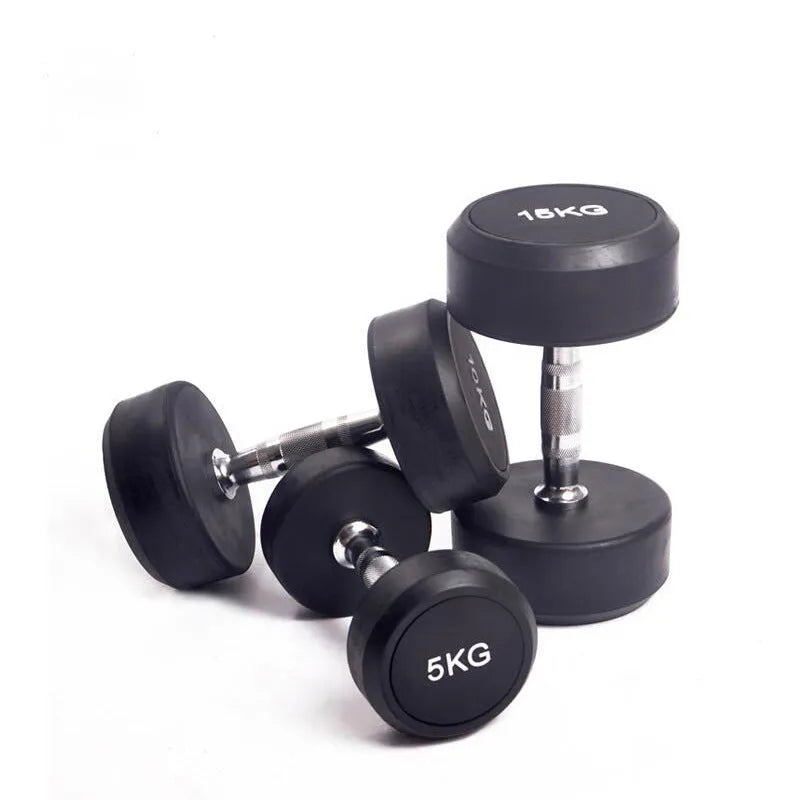 Black cast iron rubberized round head fitness dumbbell on a plain background