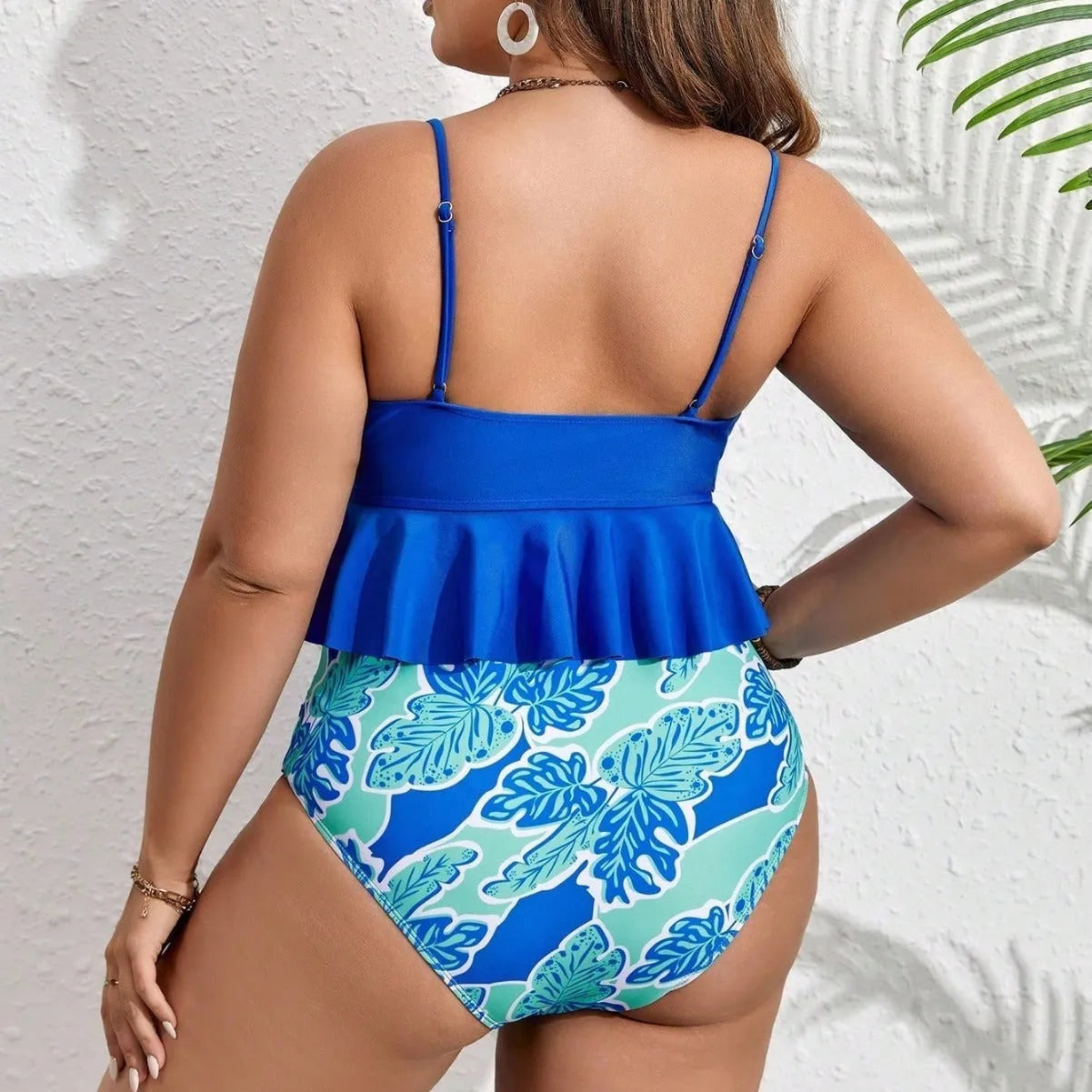 Blue plus size bikini swimsuit set with top and briefs shorts on a mannequin.