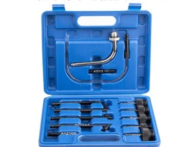 13-piece manual transmission oil refuelling kit with injector pump and connectors.