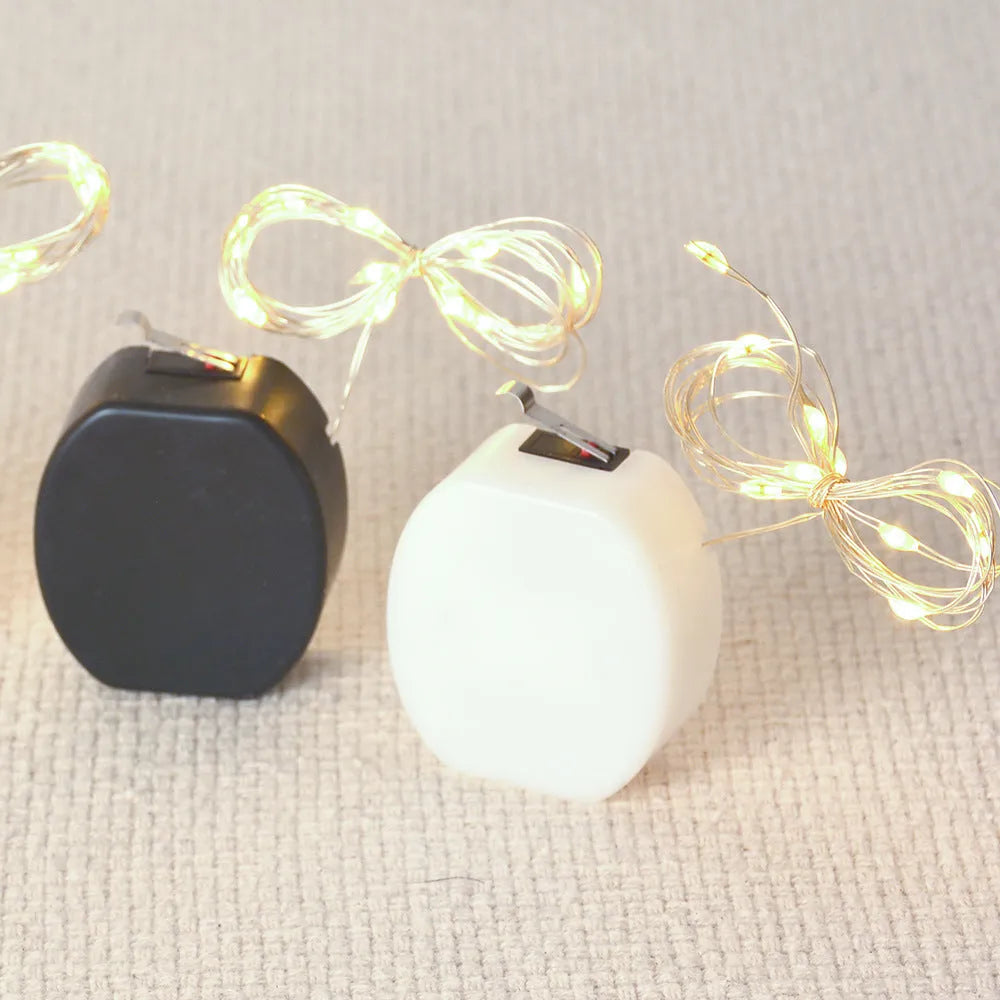 LED copper wire light string with battery box showing flexible 2 metre length with 20 white lights