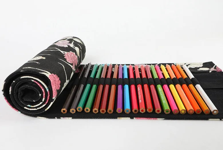 Canvas rolling pencil case with ballet girl print, showing multiple hole capacity options for colour pencils.
