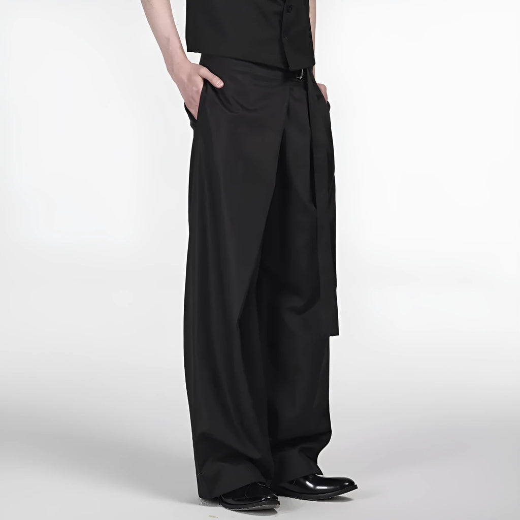 Black straight-leg trousers with adjustable waist and single pleat detail on a hanger.