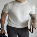 Men's slim-fit solid colour T-shirt on a hanger, shown in a wine red colour.