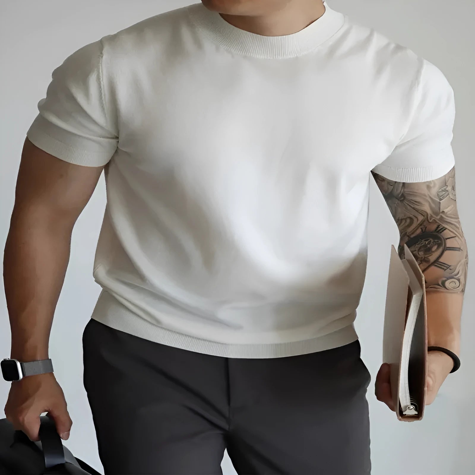 Men's slim-fit solid colour T-shirt on a hanger, shown in a wine red colour.