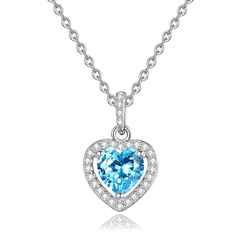 S925 sterling silver heart necklace with a natural gemstone on an adjustable cross chain for women.