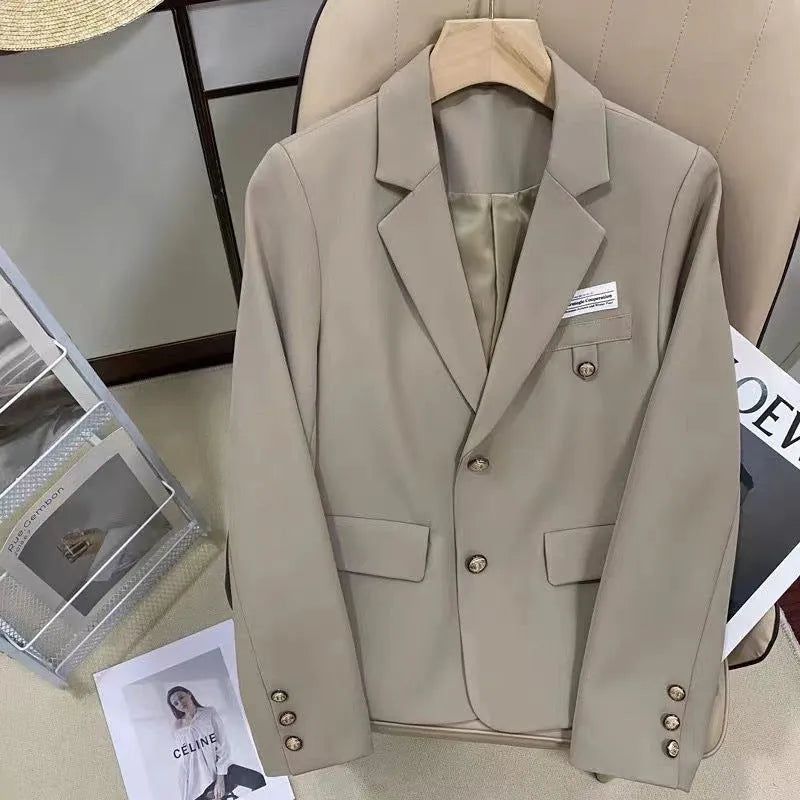 Black women's short suit coat with loose fit and long sleeves for college and commuting wear