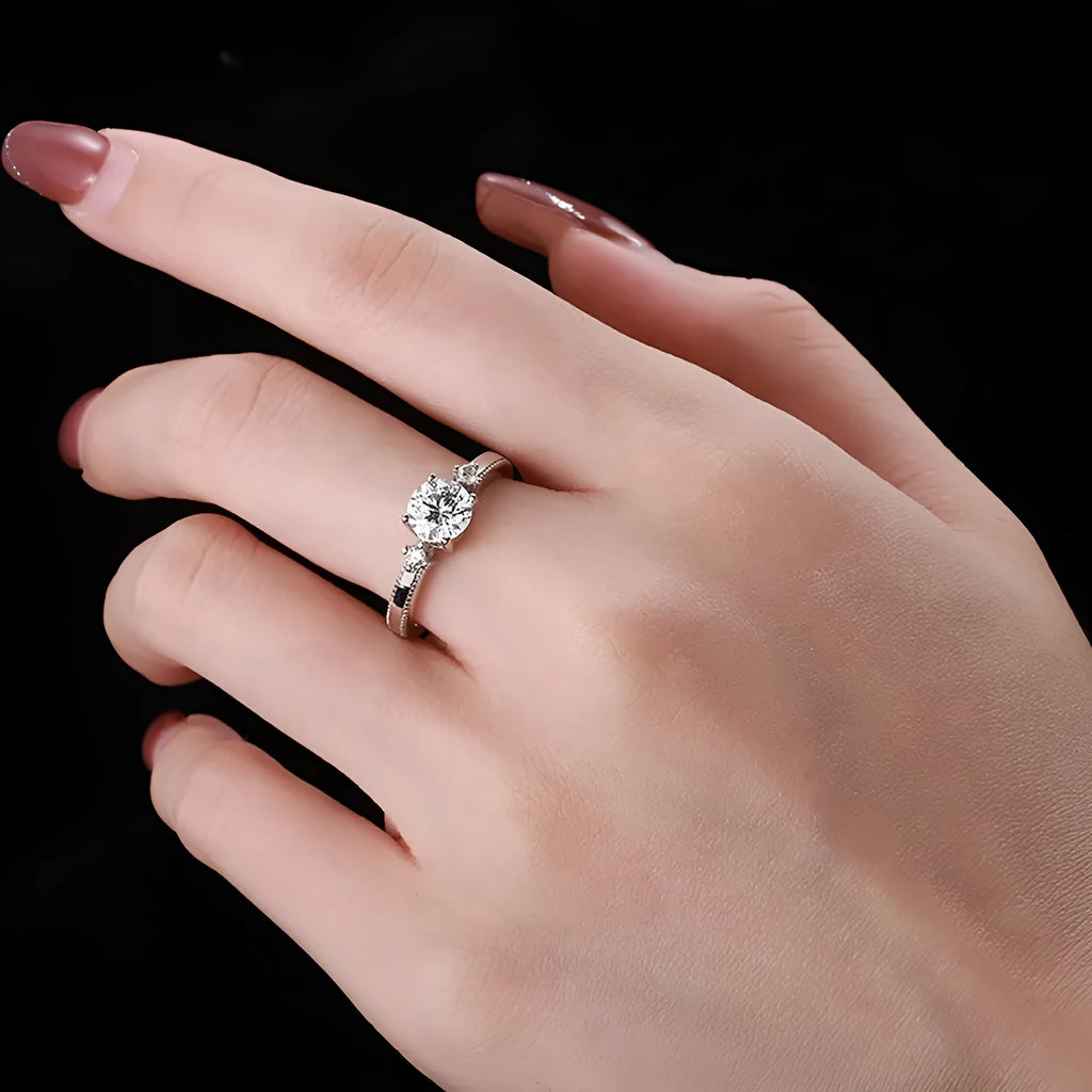 Women's classic four-claw silver ring with electroplated finish in AY120209 colour, shown on a neutral background.