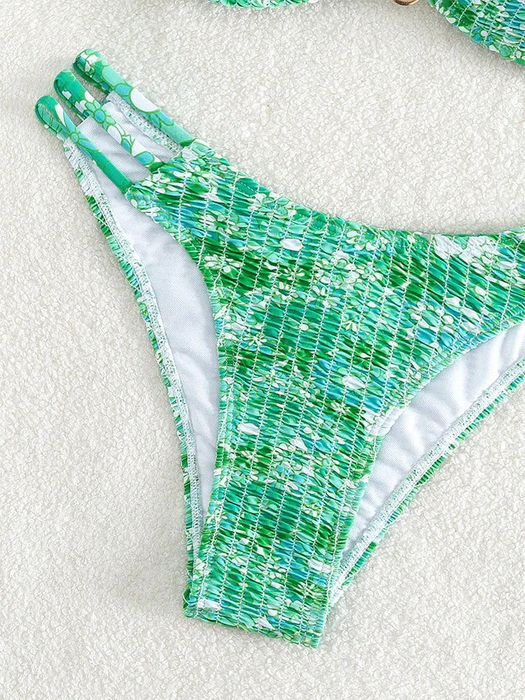 Women's high-waisted floral bikini swimsuit set in a solid colour with a briefs design.