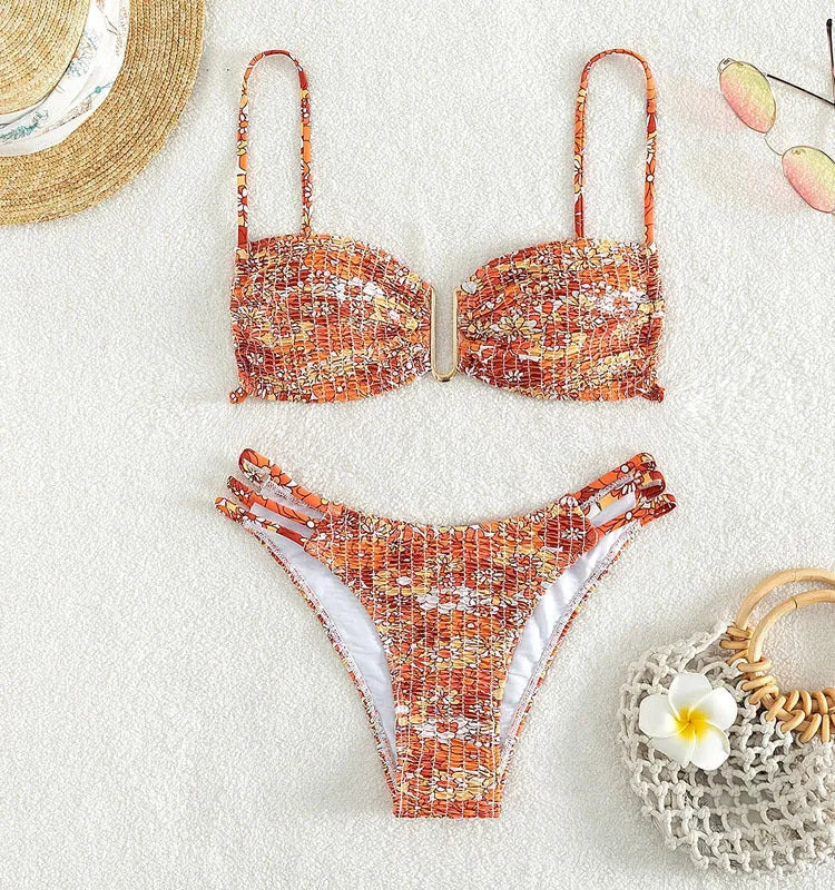Women's high-waisted floral bikini swimsuit set in a solid colour with a briefs design.