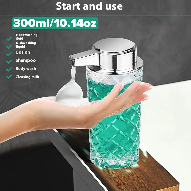 Silver automatic sensor soap dispenser with type-c charging port on a bathroom counter.