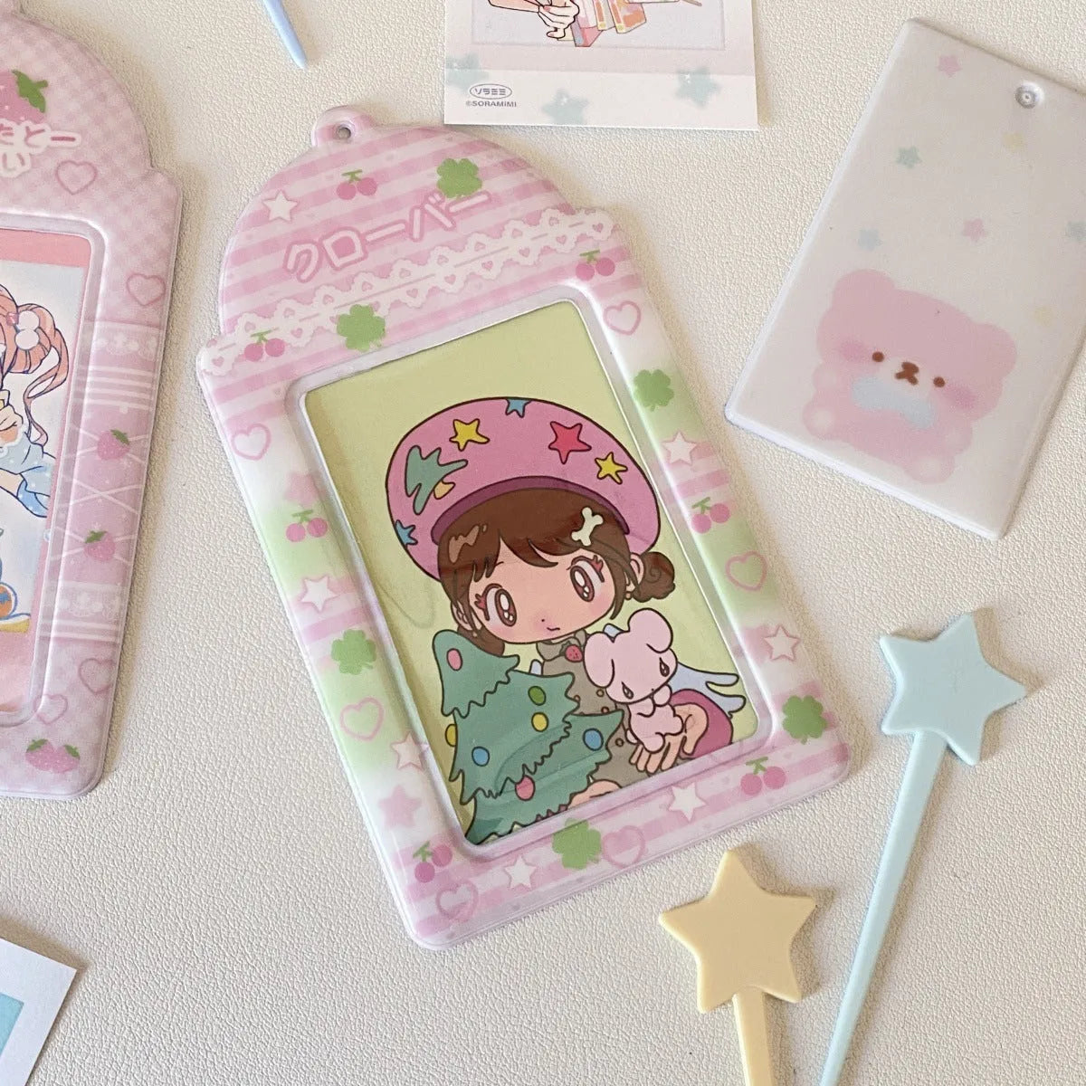 Cartoon strawberry and four-leaf clover design PVC card holders for 3-inch cards.