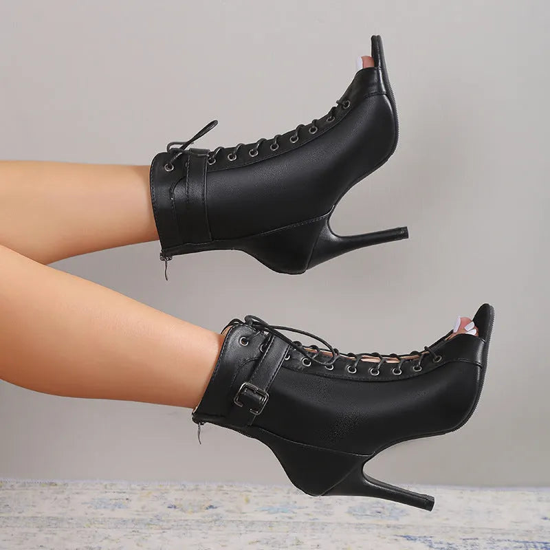 Black women's peep toe high heel pumps with back zipper and lace-up buckle detail