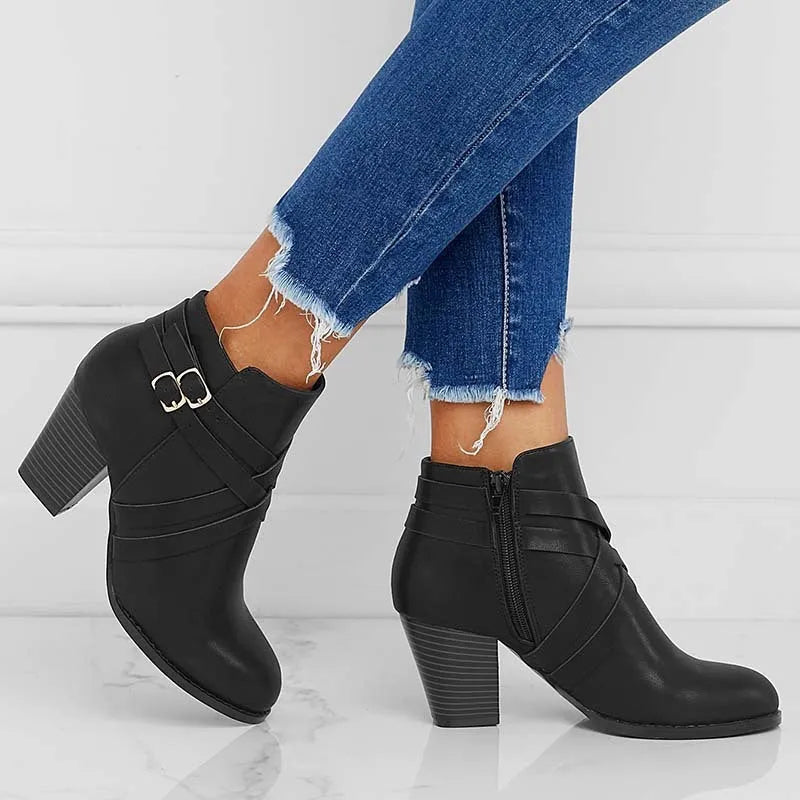 Women's black PU leather short boots with a side zipper and a 7cm thick chunky heel.