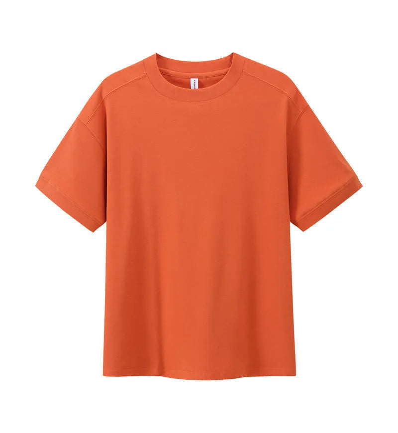 Breathable cotton pique short-sleeved T-shirt in a loose pullover style on a solid colour background.