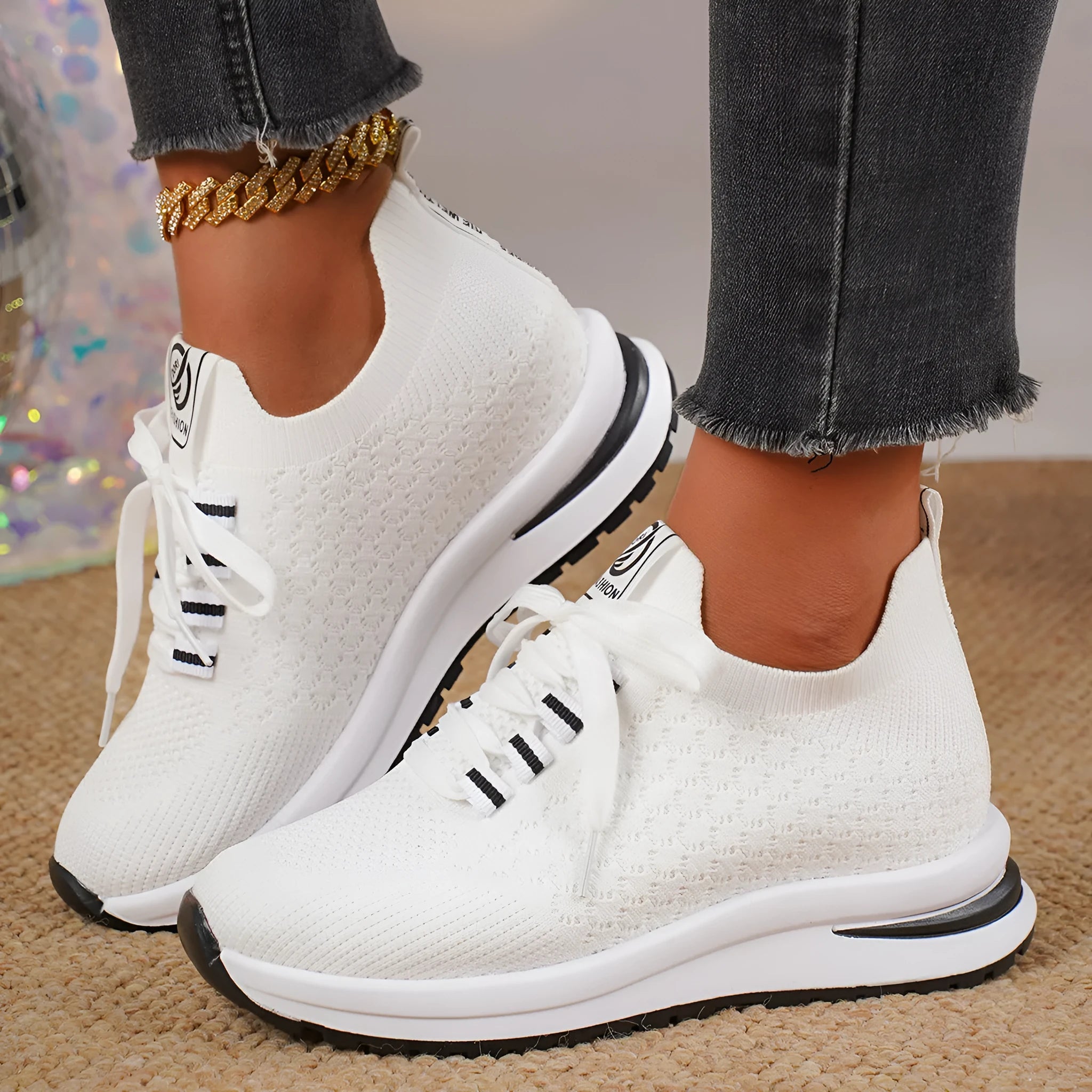 Women's black platform flat pumps with mesh upper and lace-up design on rubber sole
