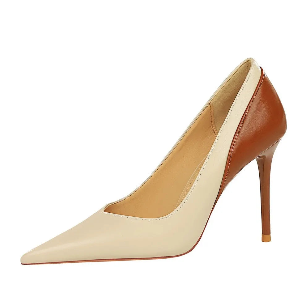 Women's black retro stiletto high heel pumps with pointed toe and super high heel