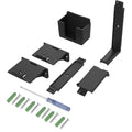 White ABS plastic wall hook holding a black game controller.