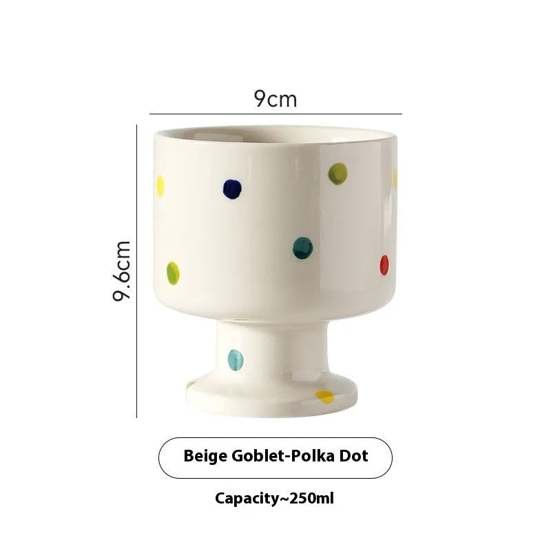 Handmade irregular solid colour ceramic mug on a table