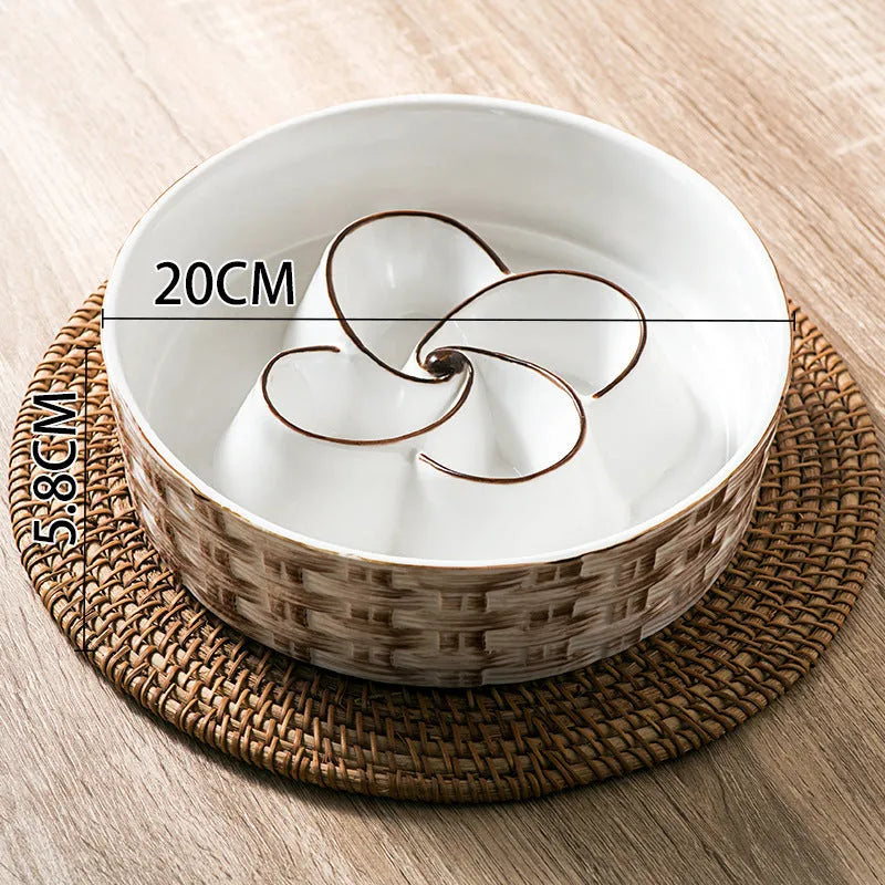 Ceramic slow feeder dog bowl with raised ridges in blue colour on a floor