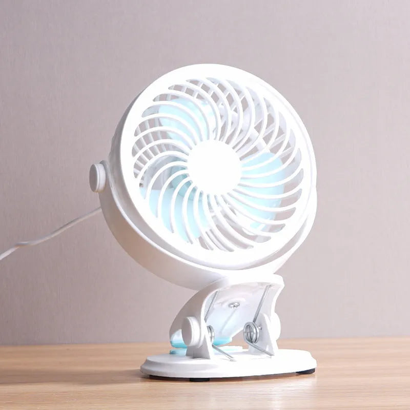 USB-powered desk fan with clip and floor stand options in compact design