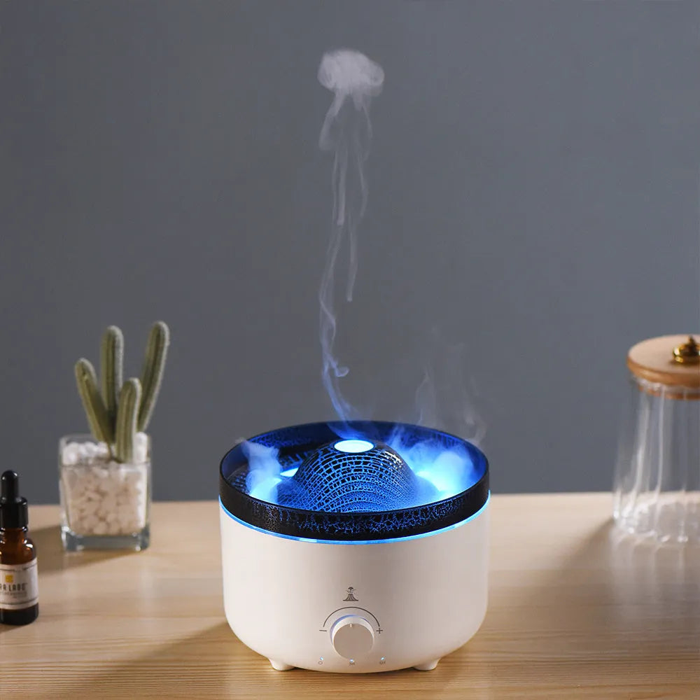 White simulated flame volcano humidifier and aroma diffuser with remote control on wooden surface