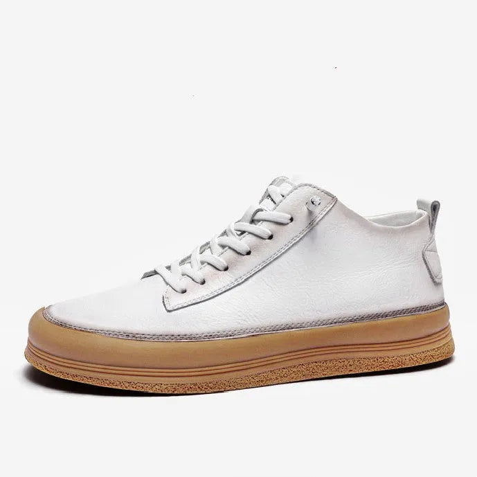 Men's black casual leather shoes with round toe and white rubber sole on a plain background.