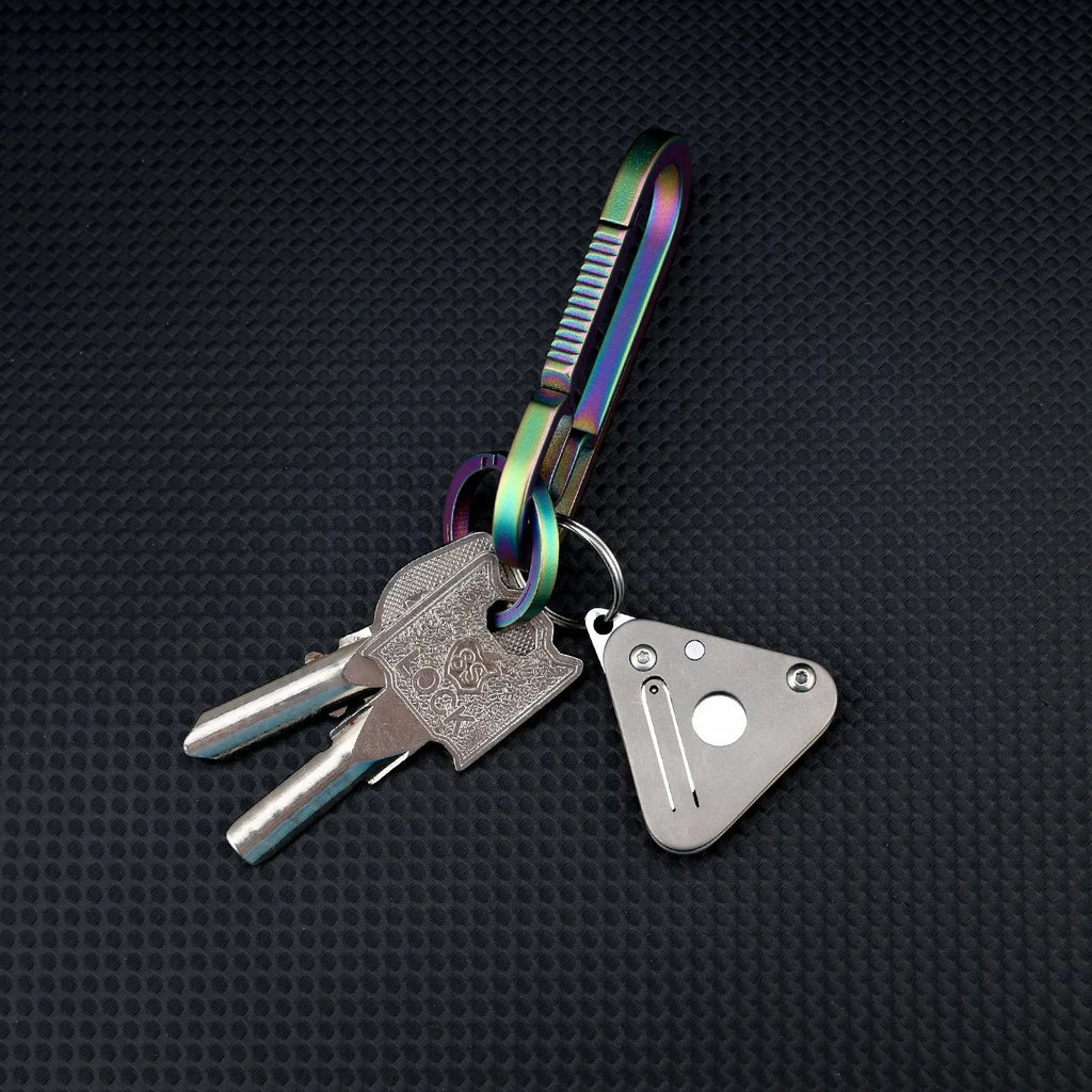 Triangle titanium alloy mini portable knife with stainless steel blade and button lock in silver gray