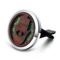 Round car vent aromatherapy clip in alloy wood construction showing hollow centre for incense