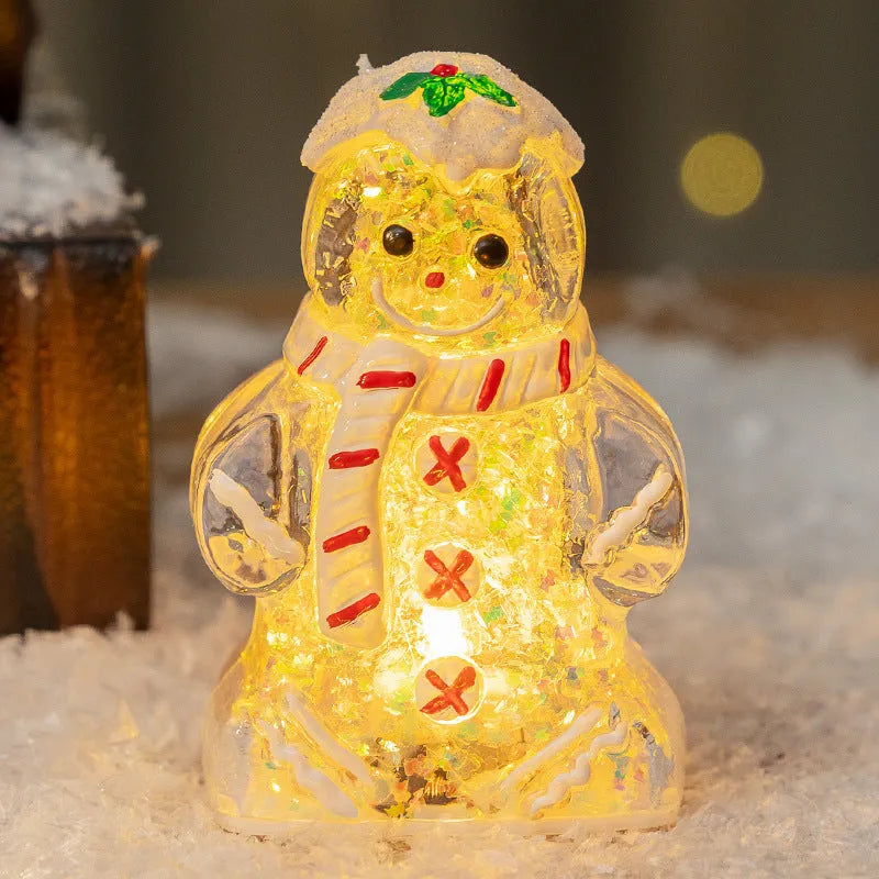 Glowing LED Christmas gingerbread man and snowman ornaments with removable scarves in different colours.