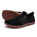 Men's lace-up casual walking shoes with a soft sole and wide toe box design in synthetic leather and mesh.