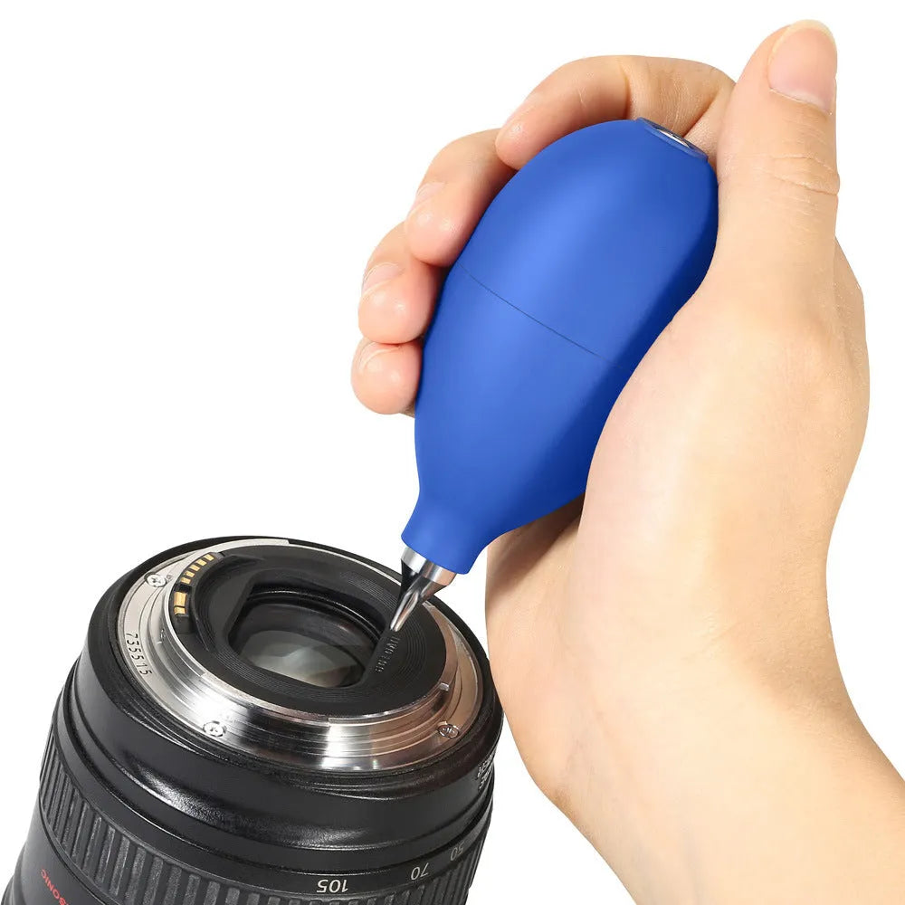 Blue and black rubber dust removal ball for cleaning cameras and mobile phones.