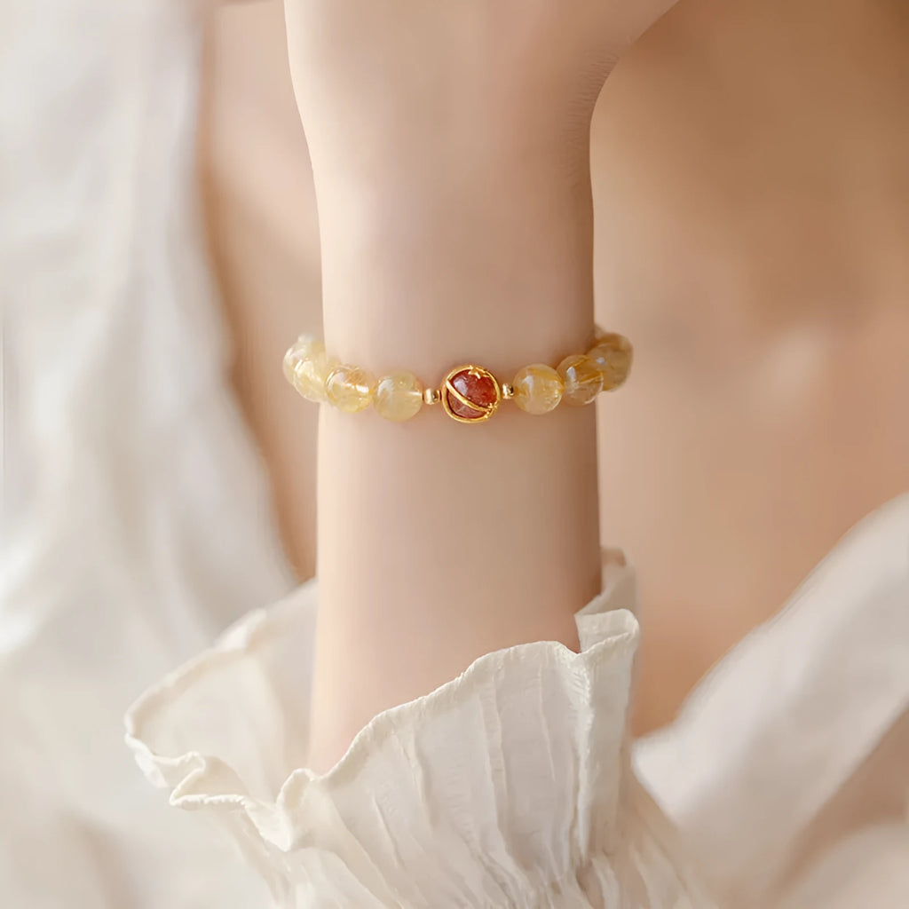Gold rutilated quartz crystal bracelet with diamond-shaped beads in unisex Korean style