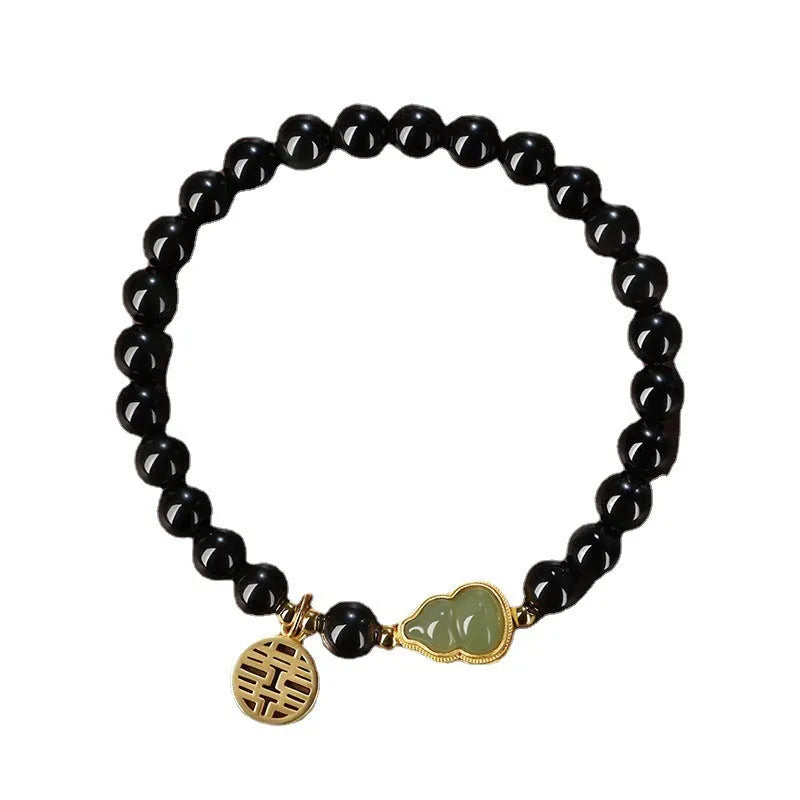 Black obsidian bracelet with a Hetian jade gourd charm, showing geometric beads in 6mm, 8mm, and 10mm size options.