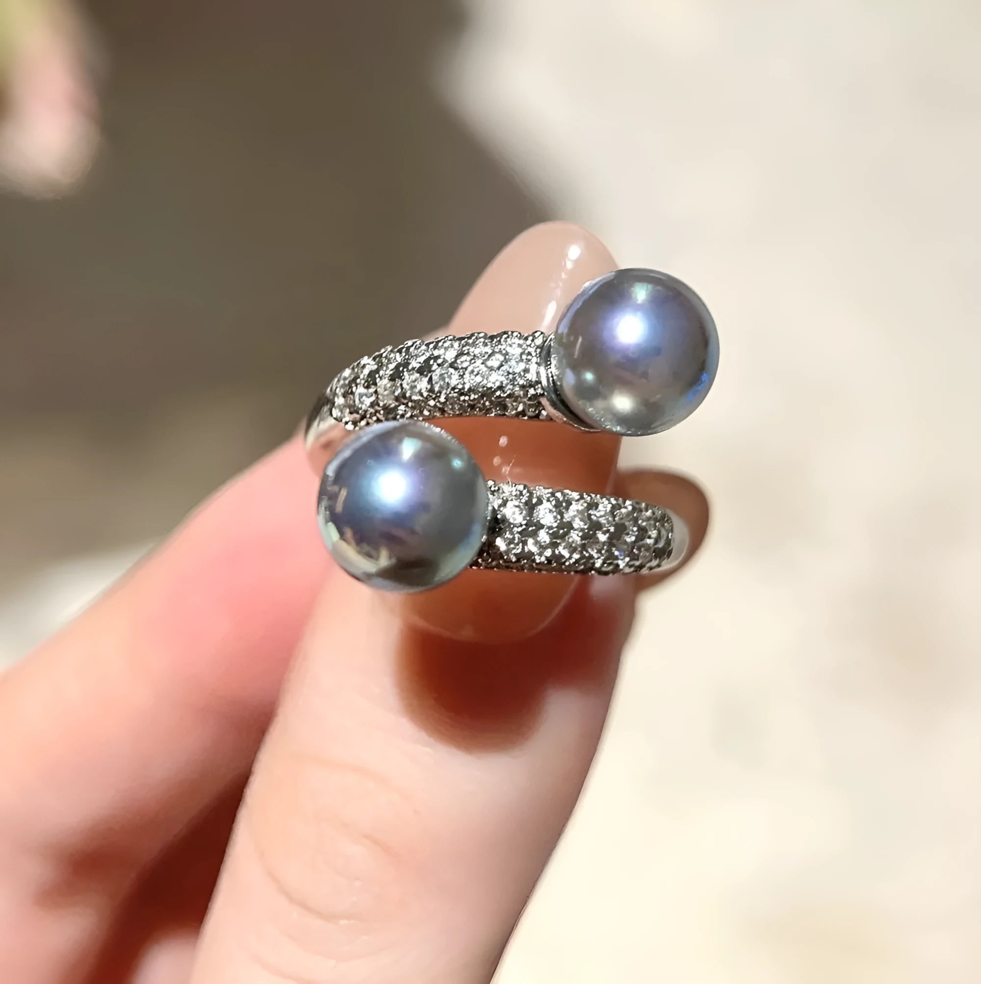Twist plate geometric ring with white shell pearl and inlaid zircon accents