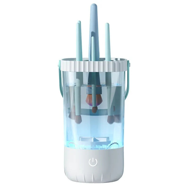 White rechargeable electric makeup brush cleaning unit with USB cable.