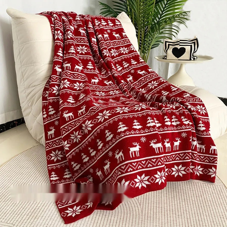 Personalised soft acrylic Christmas blanket with snowflake or reindeer print in two size options.