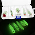 Set of five 3D fluorescent hard bait fishing lures with luminous effect on blue background.