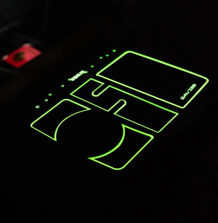 Non-slip car phone pad in black with red edge, showing 4-in-1 functions including phone holder and aromatherapy holes