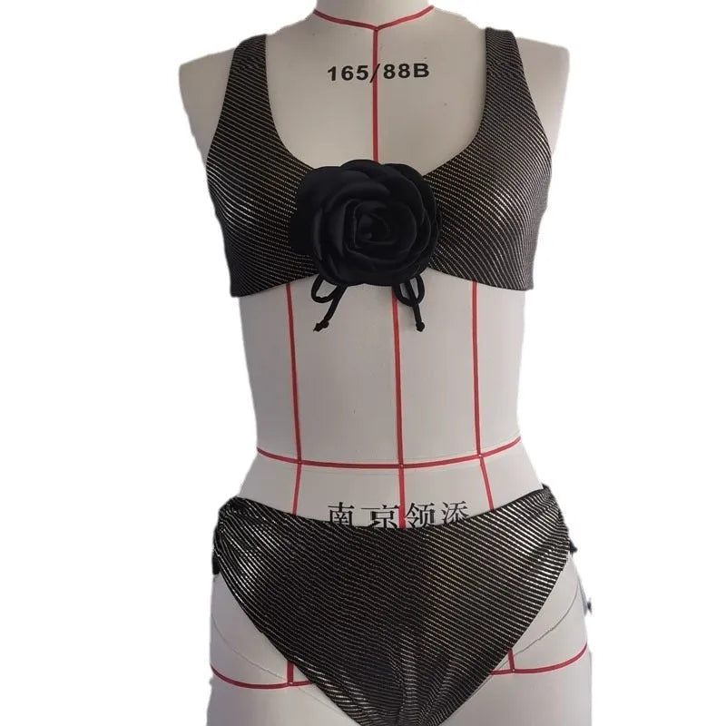 Black women's triangle top swimsuit with matching bikini pants