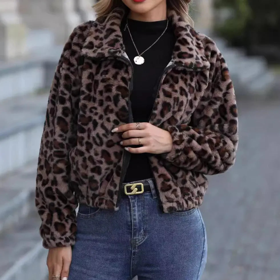 Women's loose-fitting leopard print plush coat with a front zipper and raglan sleeves.